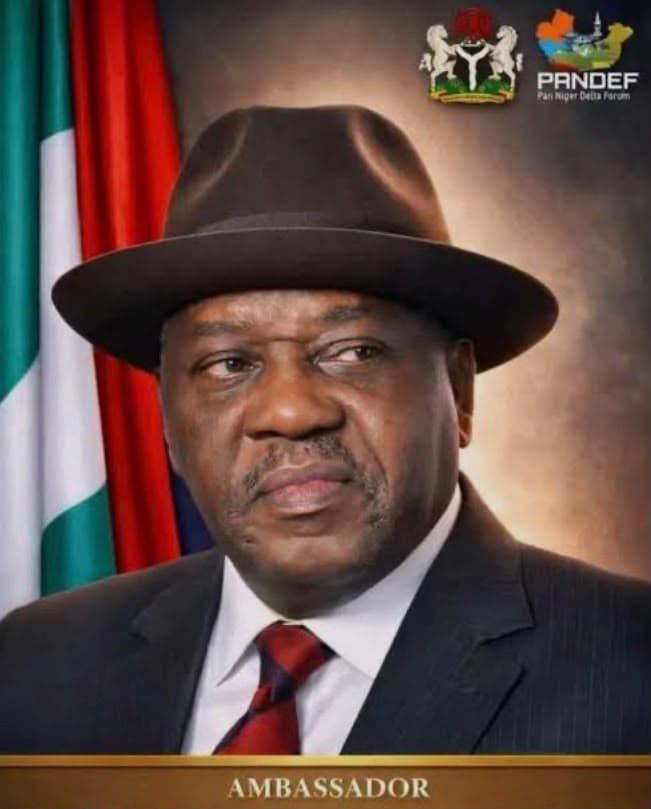 Ambassador Godknows Igali background portrait